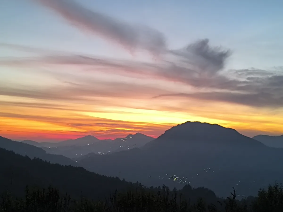 Luxury home facade framed by mountain surroundings