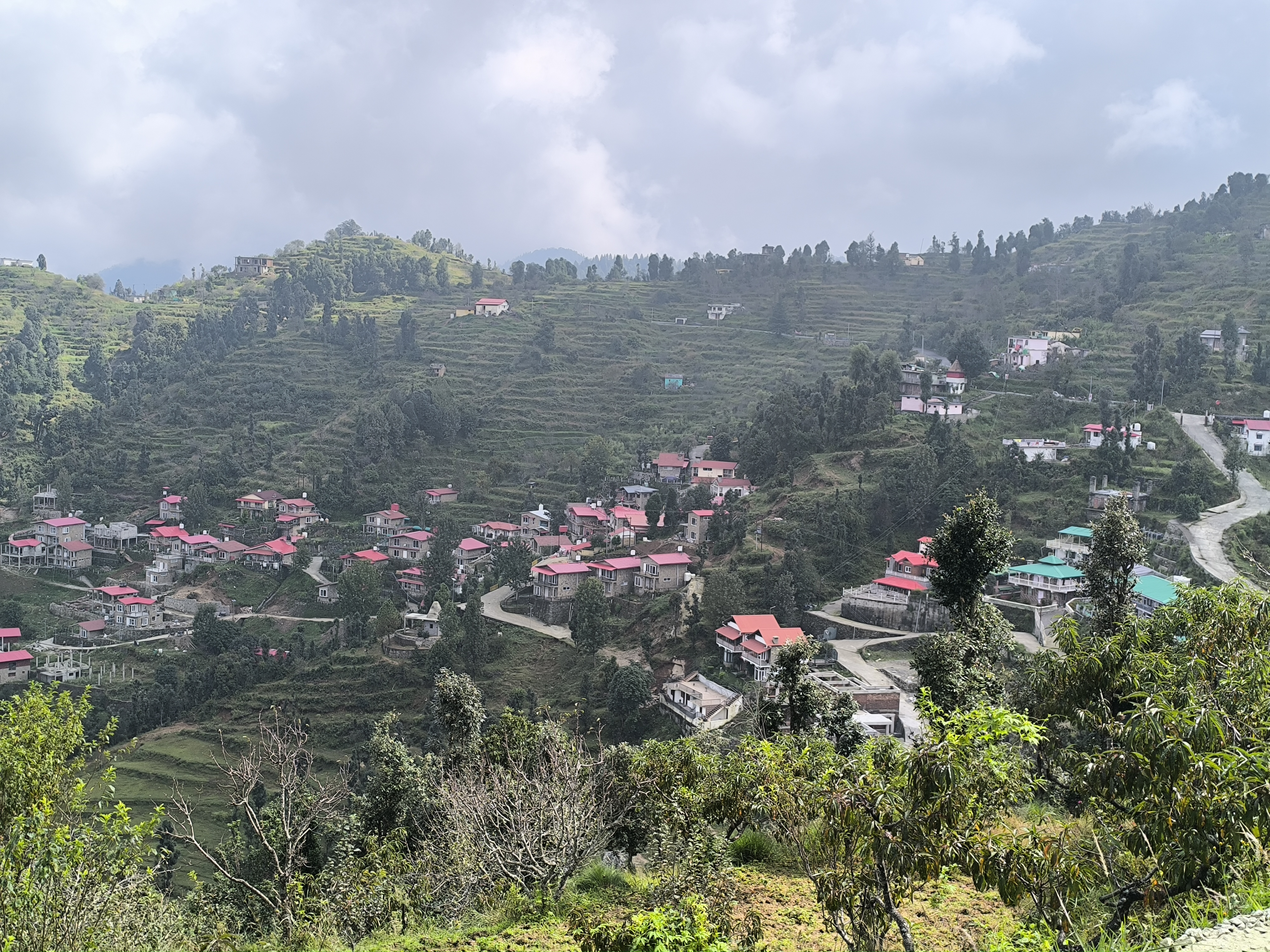 Infinity pool with cabanas and poolside seating